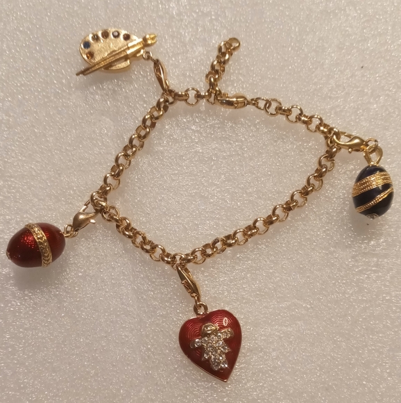 Faberge egg Jewelry - Faberge egg charm bracelet on a gold tone rolo chain.